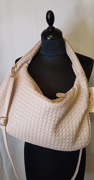 Sac tressé en cuir synthétique – coloris poudré