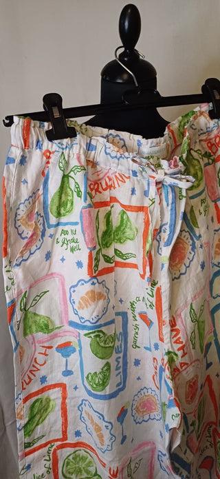 Pantalon long en lin – imprimé ciel & corail
